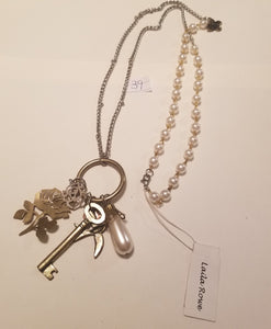 Laila rowe charm and pearl necklace