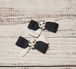 2 panda hair bows