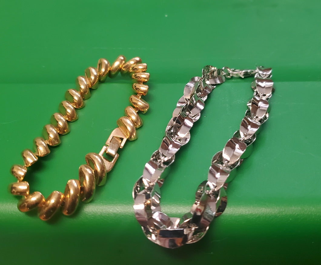 2 bracelets gold/silver