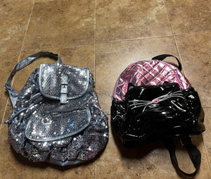 2 small bkpks-slvr Sequin & Blk/pink cat